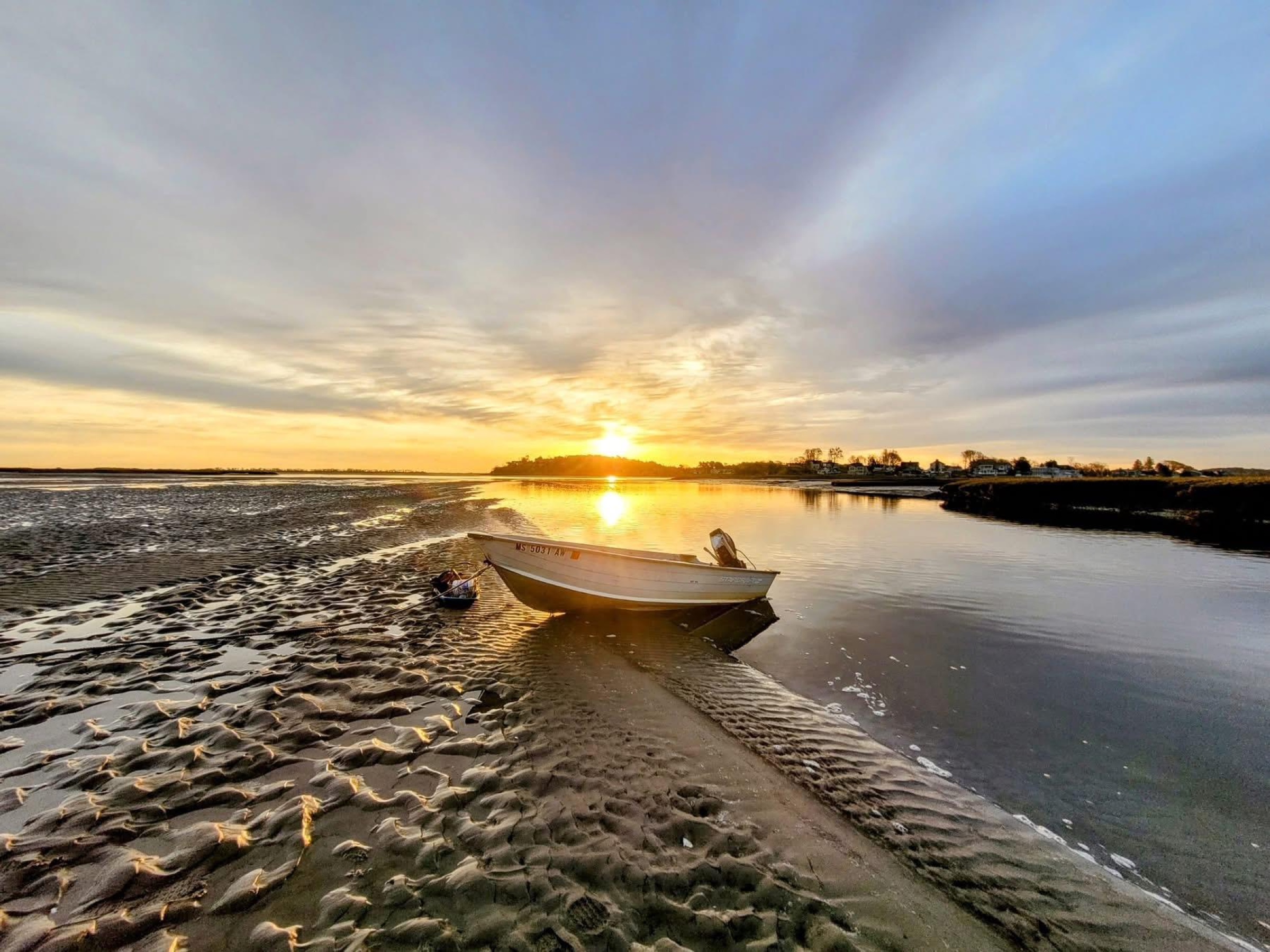 Wooden lobster boats moored at a 2nd Essex working harbor at sunrise